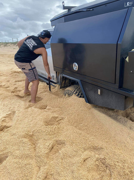 How not to get bogged at Blacksmiths Beach.